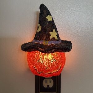 Set of 2 pumpkin night lights.